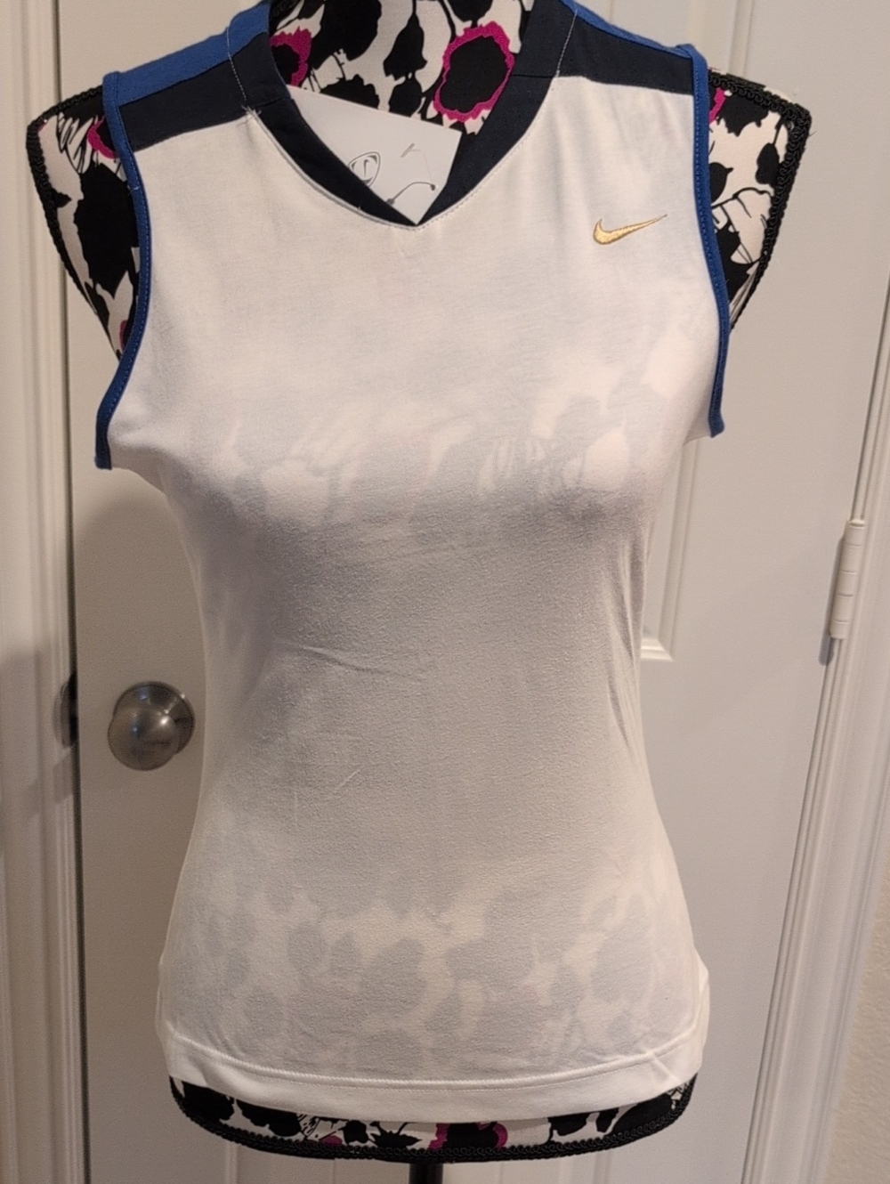 Nike White Sleeveless V-Neck Tank with Blue Trim and Gold Swoosh